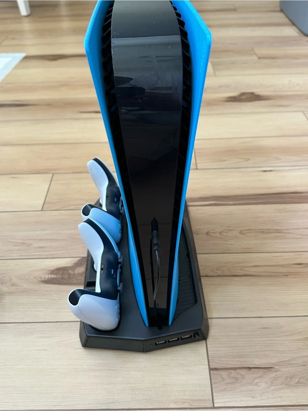 PlayStation 5 Blue Console Vertical Stand with White/Black Controllers